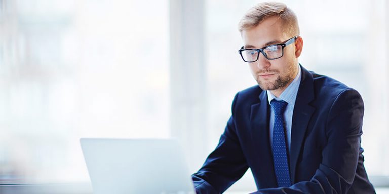 Young Businessman On Laptop