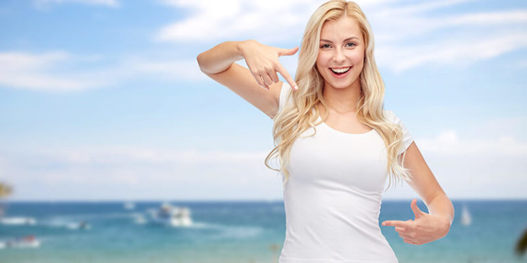 Happy Woman Pointing At Stomach