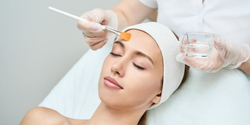 woman having chemical peel done